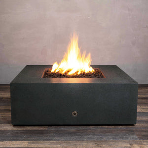 Front view of Starfire Designs Gravity 45" Square Rustic Gravity Concrete (GFRC) Fire Pit - Propane Gas Hardline - Graphite with flames on, featuring sleek modern concrete bowl design and durable construction, perfect for outdoor patio spaces. Natural gas or propane compatible, enhancing warmth and ambiance. Lava rocks included for added aesthetic.