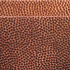 Detailed view of the hand-hammered copper texture on the 10ft Copper Spartan Gas Fire Pit, showcasing artisanal quality