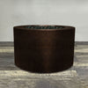 A side view of the 36" Round Gravity Powder Coated Steel Fire Pit - Natural Gas - Match Lit - Copper Vein by Starfire Designs - perfect for outdoor patio spaces. Natural gas or propane compatible, enhancing warmth and ambiance. Lava rocks included for added aesthetic.