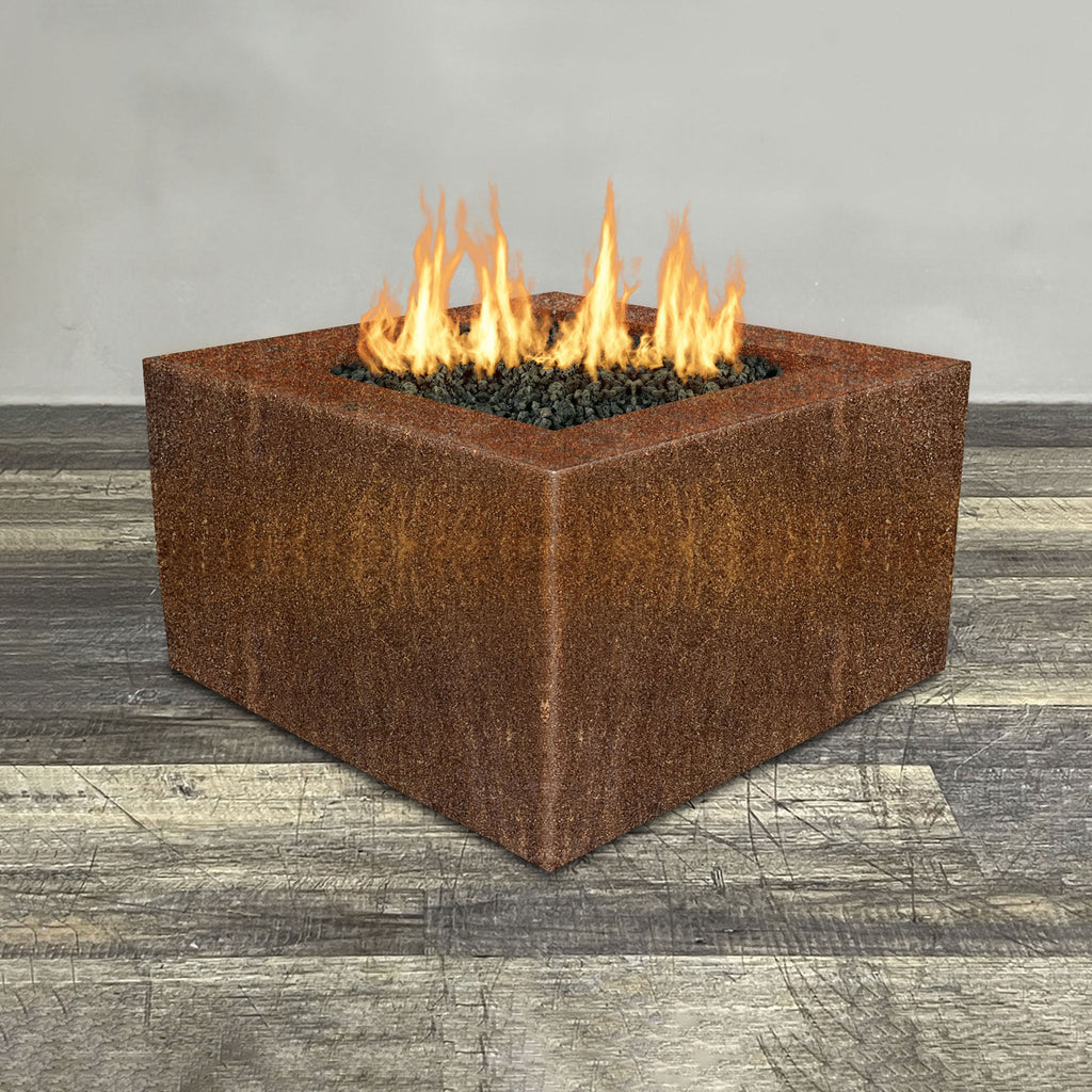 Front view of 36" Square Gravity Corten Steel Fire Pit by Starfire Designs - Brown with flames on, featuring sleek modern  design and durable construction, perfect for outdoor patio spaces. Natural gas or propane compatible, enhancing warmth and ambiance. Lava rocks included for added aesthetic.