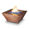 Starfire Designs 40-inch Copper Canyon gas fire pit with vibrant blue fire glass, showcasing a hammered copper finish, perfect for outdoor modern fire pits, shown on a white background