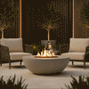 A grey modern fire pit with a bowl shape sits on a tiled patio flanked by two contemporary armchairs and manicured olive trees. Vertical wood slat walls and soft lighting create a serene, spa-like atmosphere. The steady flame of the fire feature adds warmth to this cozy backyard fire pit setting, demonstrating the calming effect of a smokeless fire pit in a private garden.