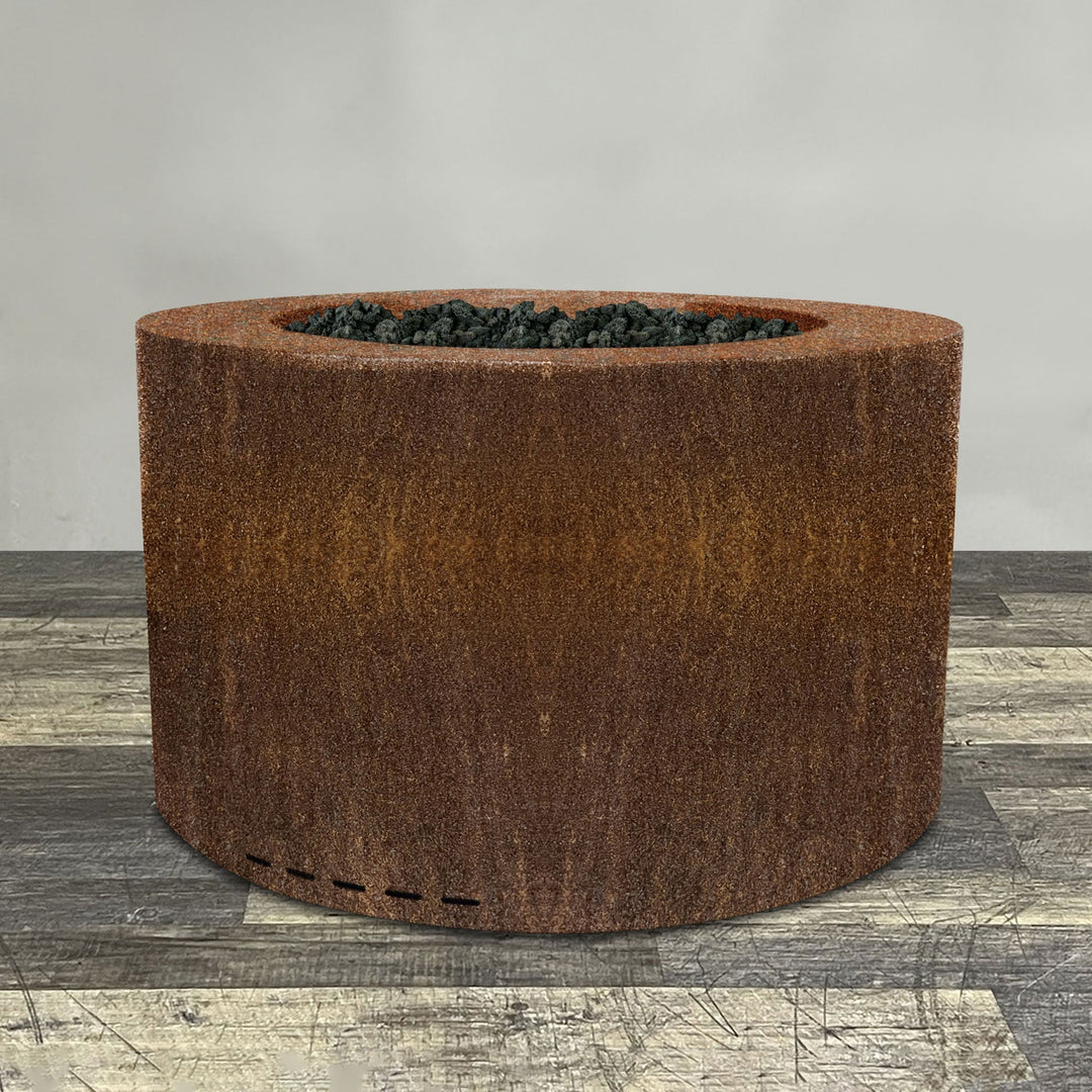 A side view of the 45" Round Gravity Corten Steel Fire Pit by Starfire Designs - perfect for outdoor patio spaces. Natural gas or propane compatible, enhancing warmth and ambiance. Lava rocks included for added aesthetic.
