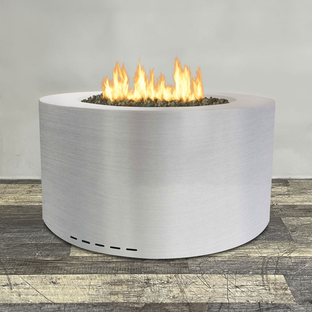 Front view of 45" Round Gravity Stainless Steel Fire Pit by Starfire Designs - Brown with flames on, featuring sleek modern  design and durable construction, perfect for outdoor patio spaces. Natural gas or propane compatible, enhancing warmth and ambiance. Lava rocks included for added aesthetic.
