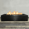 Front view of 72" x 38" Rectangle Gravity Powder Coated Steel Fire Pit - Natural Gas - 110V CSA On/Off Electronic Ignition System - Silver Vein by Starfire Designs - Brown with flames on, featuring sleek modern concrete design and durable construction, perfect for outdoor patio spaces. Natural gas or propane compatible, enhancing warmth and ambiance. Lava rocks included for added aesthetic.