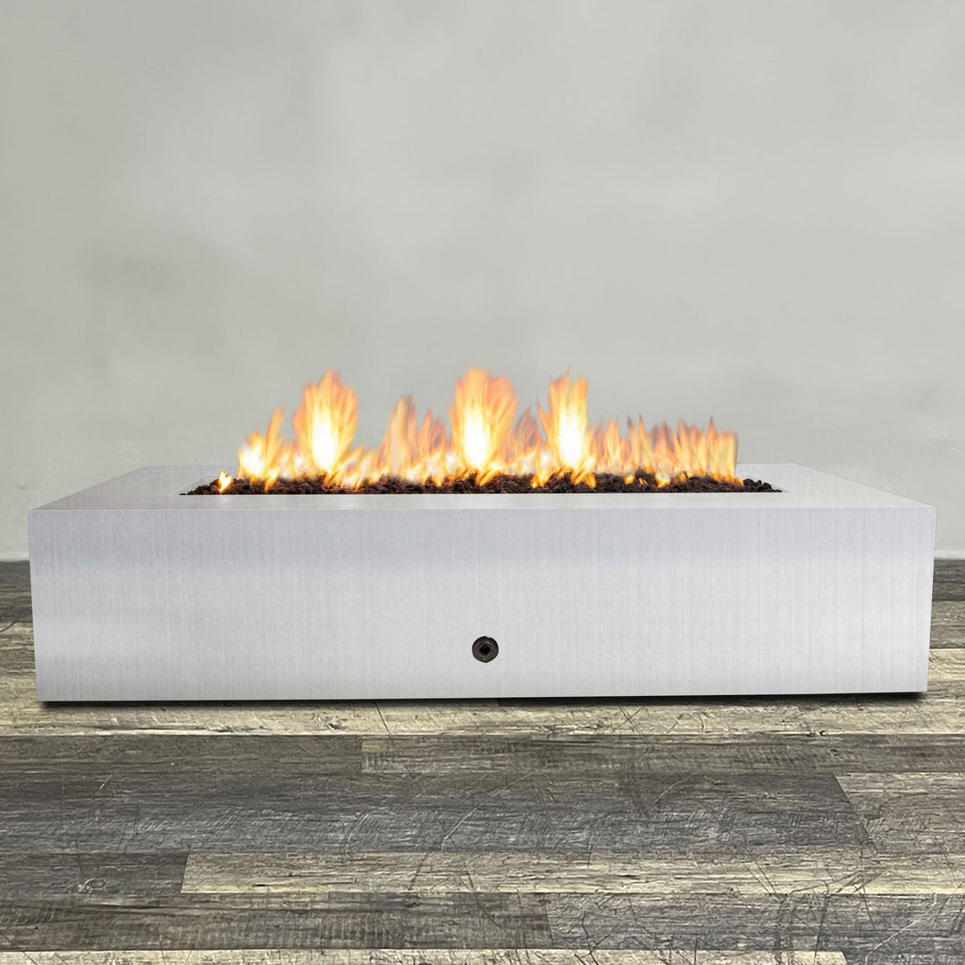 Front view of 72" x 38" Rectangle Gravity Stainless Steel Fire Pit - Natural Gas - Match Lit by Starfire Designs - Brown with flames on, featuring sleek modern  design and durable construction, perfect for outdoor patio spaces. Natural gas or propane compatible, enhancing warmth and ambiance. Lava rocks included for added aesthetic.