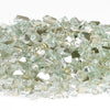 Close-up of American Fire Products 1/4" Platinum Reflective Fire Glass showcasing its clear, jewel-like pieces and shimmering mirrored backing—perfect for adding a refined sparkle and modern touch to gas fire pits and fireplaces.