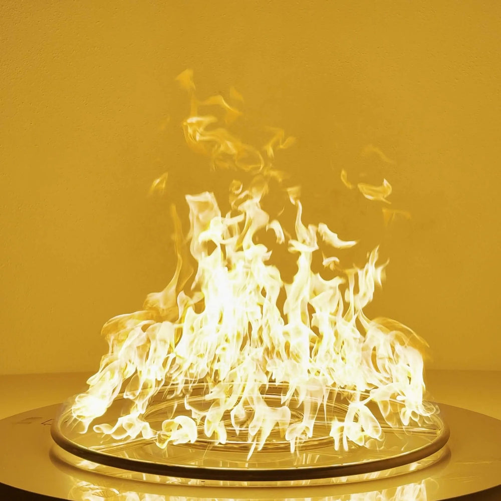 The 30-Inch Athena Fire Glass Fire Ring Burner in action, featuring tall, bright flames evenly distributed across its triple-ring stainless steel construction.