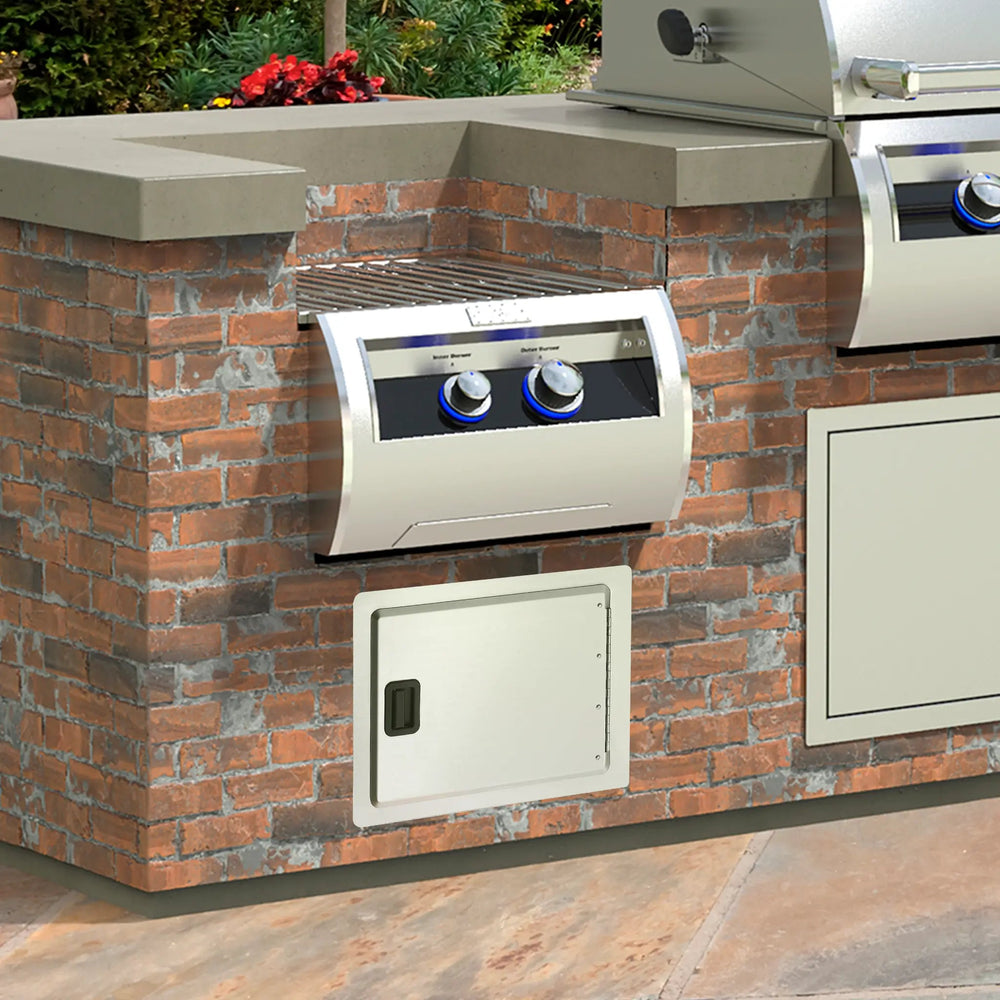Fire Magic 17.5" x 24.5" Legacy Single Access Door is installed below the searing side burner of Fire Magic outdoor kitchen setup