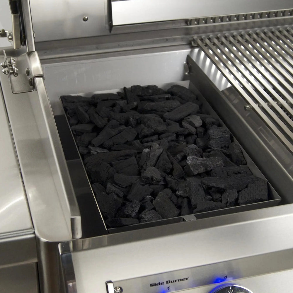 Fire Magic Charcoal Smoker Basket for A54 and A43 Grills installed inside the Fire Magic grill with charcoal pieces
