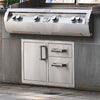 Fire Magic Premium Access Door with Double Drawers installed beneath a very large grill from Fire Magic in an outdoor kitchen patio