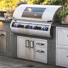 Fire Magic Premium Access Door with Platter Storage and Double Drawers installed beeath an enormous Fire Magic grill in an outdoor kitchen setup.