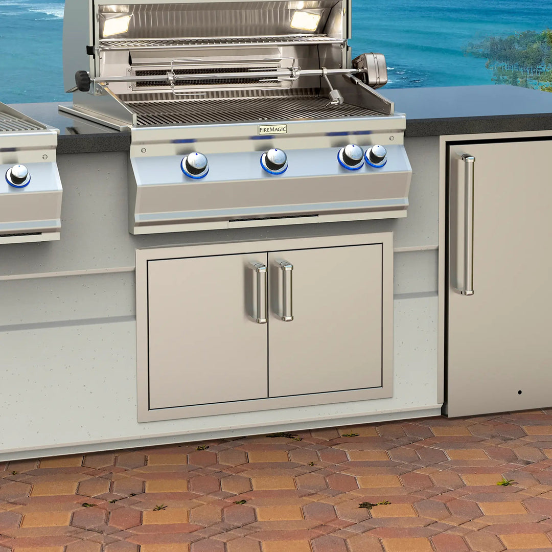 Fire Magic Premium Double Doors with 2 Dual Drawers built into an outdoor cooking area to look stylish and flush