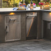 Fire Magic Premium Large Pantry Door and Drawer Combo installed into the counter of a modern outdoor kitchen setup