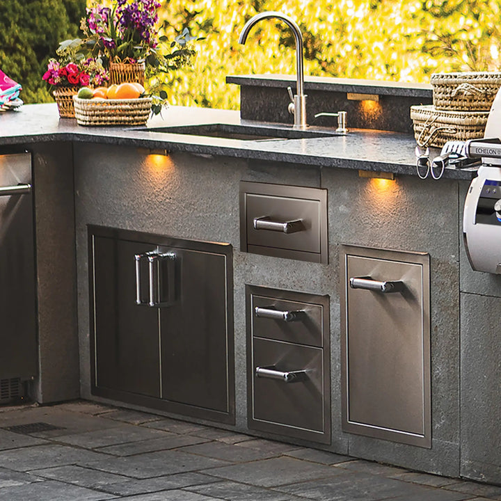 Fire Magic Premium Single Drawer installed amongst others in the series beneath an outdoor kitchen sink