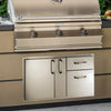 Fire Magic Select Access Door with Platter Storage and Double Drawers installed into a stone outdoor kitchen area.