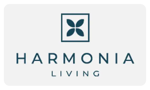 The Harmonia Living logo featuring the brand name in turqoise with a stylized flower icon, representing their premium furniture products.