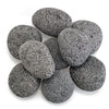 Large natural lava stones in deep gray and black hues with a rugged, porous texture—ideal for adding a bold, earthy aesthetic to fire pits, fireplaces, and outdoor design projects.