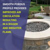 Round outdoor fire pit filled with small gray lava stones by American Fire Products, designed to boost airflow for a bigger, brighter flame—set in a landscaped patio with bold text highlighting performance benefits.