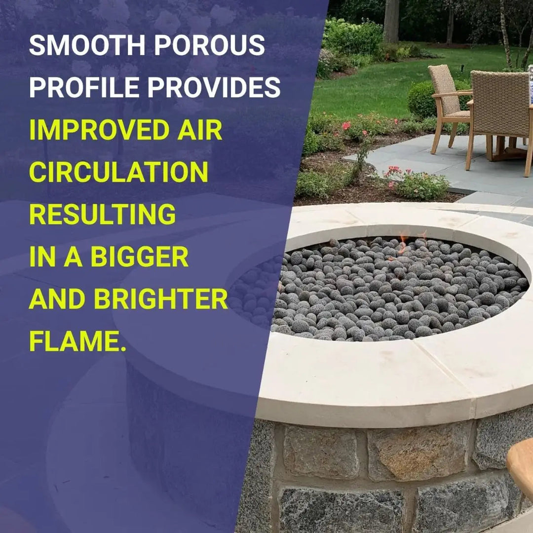 Round outdoor fire pit filled with small gray lava stones by American Fire Products, designed to boost airflow for a bigger, brighter flame—set in a landscaped patio with bold text highlighting performance benefits.