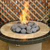 Round fire pit table with polished stone top featuring extra-large gray lava stones from Starfire Direct, producing vibrant flames for a modern, natural centerpiece in outdoor settings.
