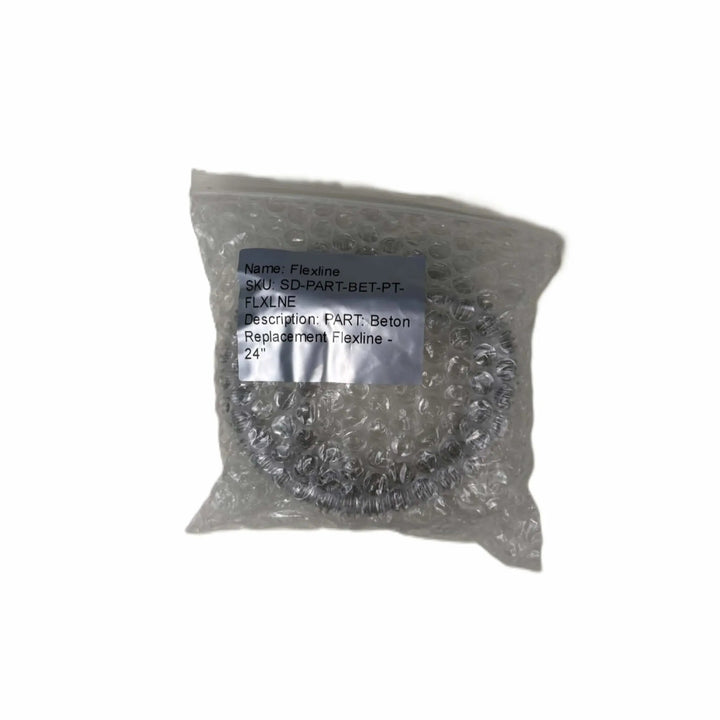 Starfire Designs Béton Fire Pit Replacement Flex Line packaged in bubble wrap, labeled as a 24-inch stainless steel flexible gas connector.
