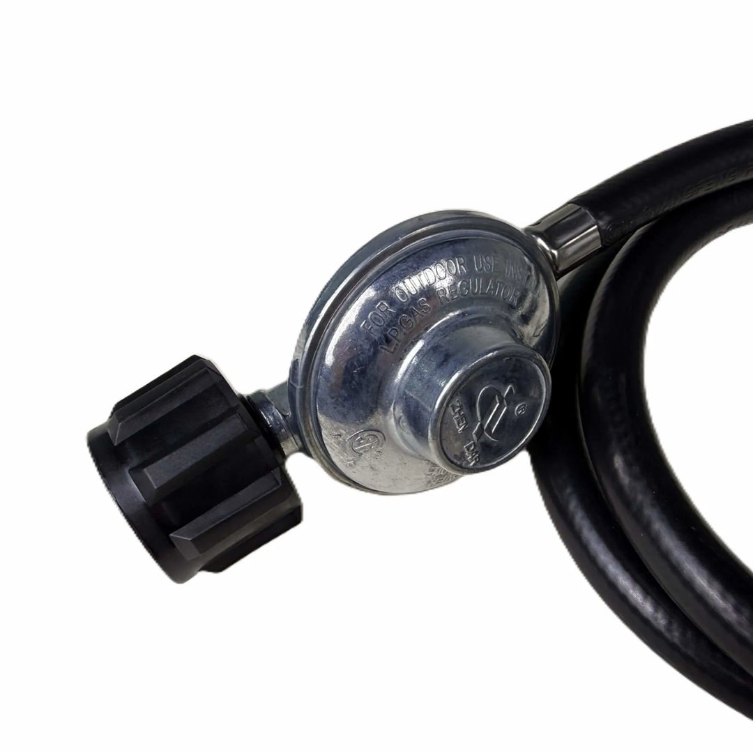 Detailed view of the Starfire Designs Béton Fire Pit Replacement Regulator showing the LP gas label and sturdy metal construction for safe propane flow control.