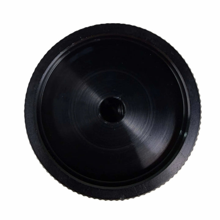 Close-up of the Starfire Designs Béton Fire Pit Replacement Valve Knob, showing the back view of the sleek black metal control knob with a precision center bore.