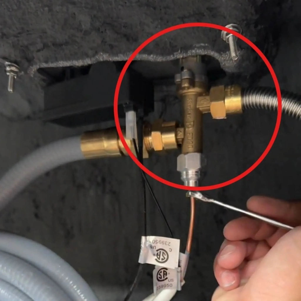 Starfire Designs Béton Fire Pit Replacement Natural Gas Valve shown installed beneath the fire pit enclosure, connecting to gas lines for proper fuel control and ignition safety.