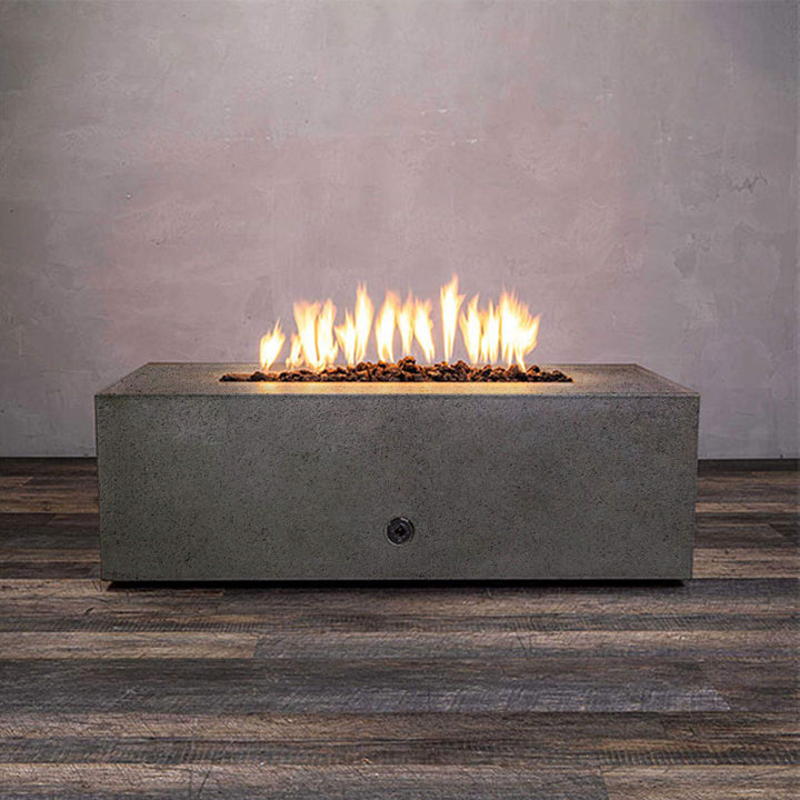 Front view of Starfire Designs Gravity 48" x 32" Rectangle Rustic Gravity Concrete (GFRC) Fire Pit - Propane Gas Hardline - Brown with flames on, featuring sleek modern concrete bowl design and durable construction, perfect for outdoor patio spaces. Natural gas or propane compatible, enhancing warmth and ambiance. Lava rocks included for added aesthetic.
