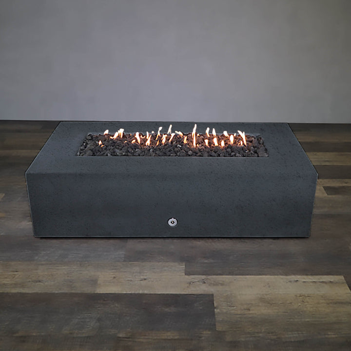 Front view of Starfire Designs Gravity 72" x 38" Rectangle Rustic Gravity Concrete (GFRC) Fire Pit - Propane Gas Hardline - Graphite with flames on, featuring sleek modern concrete bowl design and durable construction, perfect for outdoor patio spaces. Natural gas or propane compatible, enhancing warmth and ambiance. Lava rocks included for added aesthetic.
