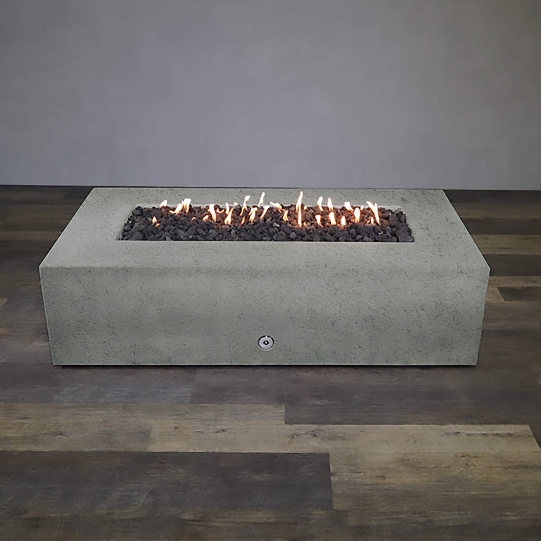 Front view of Starfire Designs Gravity 72" x 38" Rectangle Rustic Gravity Concrete (GFRC) Fire Pit - Propane Gas Hardline - Natural Gray with flames on, featuring sleek modern concrete bowl design and durable construction, perfect for outdoor patio spaces. Natural gas or propane compatible, enhancing warmth and ambiance. Lava rocks included for added aesthetic.