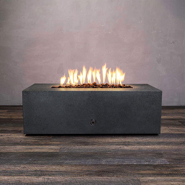 Front view of Starfire Designs Gravity 48" x 32" Rectangle Rustic Gravity Concrete (GFRC) Fire Pit - Propane Gas Hardline - Graphite with flames on, featuring sleek modern concrete bowl design and durable construction, perfect for outdoor patio spaces. Natural gas or propane compatible, enhancing warmth and ambiance. Lava rocks included for added aesthetic.
