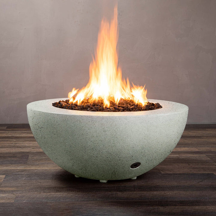 Front view of Starfire Designs Gravity 36" Round Rustic Gravity Concrete (GFRC) Fire Pit - Propane Gas Hardline - Natural Gray with flames on, featuring sleek modern concrete bowl design and durable construction, perfect for outdoor patio spaces. Natural gas or propane compatible, enhancing warmth and ambiance. Lava rocks included for added aesthetic.
