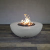 Front view of Starfire Designs Gravity 45" Round Rustic Gravity Concrete (GFRC) Fire Pit - Propane Gas Hardline - Natural Gray with flames on, featuring sleek modern concrete bowl design and durable construction, perfect for outdoor patio spaces. Natural gas or propane compatible, enhancing warmth and ambiance. Lava rocks included for added aesthetic.

