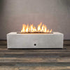 Front view of Starfire Designs Gravity 60" x 32" Rectangle Rustic Gravity Concrete (GFRC) Fire Pit - Propane Gas Hardline - White with flames on, featuring sleek modern concrete bowl design and durable construction, perfect for outdoor patio spaces. Natural gas or propane compatible, enhancing warmth and ambiance. Lava rocks included for added aesthetic.
