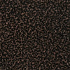 Detailed swatch of The Outdoor Plus Copper Vein powder-coated metal, featuring a rich, speckled black and bronze texture that adds depth and industrial charm to outdoor decor.