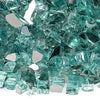 Close-up view of American Fire Products 1/4-inch Azuria reflective fire glass featuring vibrant turquoise blue chunks with dazzling mirrored finishes, ideal for upscale fire pits and fireplaces.