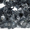 Close-up of 1/4" Gray Reflective Fire Glass by American Fire Products, showcasing its brilliant silver-gray hues and mirrored edges that catch the light for a dazzling, upscale fire feature display.