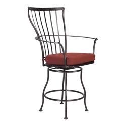 Wrought iron outdoor bar stool with curved backrest, armrests, and a rust-colored cushion, ideal for patio and outdoor bar areas
