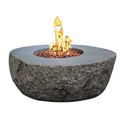 Natural stone gas fire pit with an oval shape and rough texture, featuring a central fire burner with realistic lava rocks. Perfect for rustic and natural outdoor settings