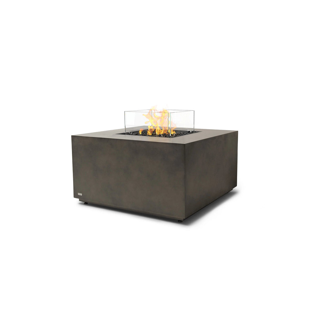 The EcoSmart Fire Chaser 38 Natural propane fire pit with a wind guard, designed for modern outdoor living spaces. Its concrete base in a natural finish complements contemporary designs, while the propane gas burner ensures warmth and ambiance for backyard gatherings.