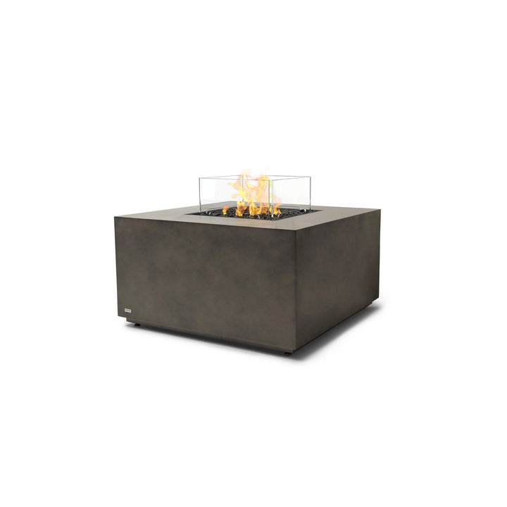 The EcoSmart Fire Chaser 38 Natural propane fire pit with a wind guard, designed for modern outdoor living spaces. Its concrete base in a natural finish complements contemporary designs, while the propane gas burner ensures warmth and ambiance for backyard gatherings.