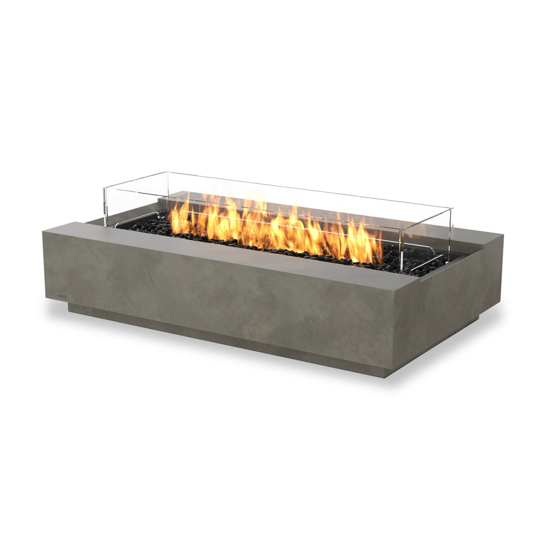 The EcoSmart Fire Cosmo 50 Natural propane fire pit features a natural concrete body with a glass wind guard to enhance flame stability. This rectangular fire pit is an elegant addition to patios, backyards, and outdoor lounge areas, providing a clean-burning propane flame with modern, contemporary aesthetics. 