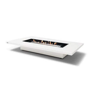 The EcoSmart Fire Daiquiri 70 Bone fire pit features a stainless steel burner set within a contemporary concrete structure, delivering a sophisticated touch to any outdoor space. This long rectangular gas fire pit is ideal for large backyard setups, offering a clean-burning flame and durable design. Whether used as a natural gas fire pit or a propane-powered outdoor fire table, it enhances modern patios with style and warmth.