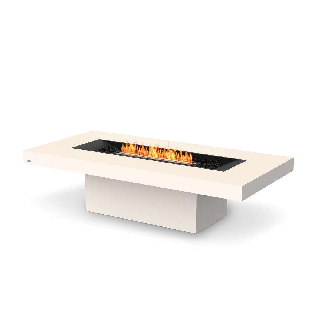 The EcoSmart Fire Gin 90 Chat Height Bone is a modern outdoor fire pit with a sleek bone-colored concrete finish and a black burner insert. This low-profile fire pit offers a sophisticated rectangular design, featuring durable weather-resistant construction and an elevated base for stability. Perfect for patios, backyards, and luxury outdoor spaces, this natural gas fire pit produces a stunning flame display over black fire media.