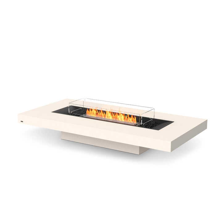 EcoSmart Fire Gin 90 (Low) Bone modern fire pit featuring a black burner with a glass wind guard, offering a sleek, contemporary design. This low-profile rectangular gas fire table is ideal for outdoor patios and provides warmth and ambiance for entertaining spaces.