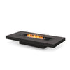 The EcoSmart Fire Gin 90 Low Graphite Fire Pit Table features a sleek black burner with a wind guard for added safety. This modern outdoor fire pit is designed for luxury patios, offering a long, rectangular gas fire table that enhances any contemporary outdoor space. Perfect for use as a fire pit coffee table, this unit provides elegant ambiance and high-performance heating.