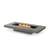 The EcoSmart Fire Gin 90 Low Natural fire pit showcases a black burner set in a contemporary, low-profile concrete table. Designed for both residential and commercial outdoor spaces, this natural gas fire pit blends seamlessly with modern patio furniture, creating a cozy and elegant ambiance.