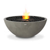 The EcoSmart Fire Mix 850 Natural Fire Pit features a warm, earthy-toned concrete bowl with a black burner, delivering a bold and refined fire display. This natural gas fire pit alternative provides a smokeless flame, perfect for luxury backyard designs and commercial outdoor spaces.